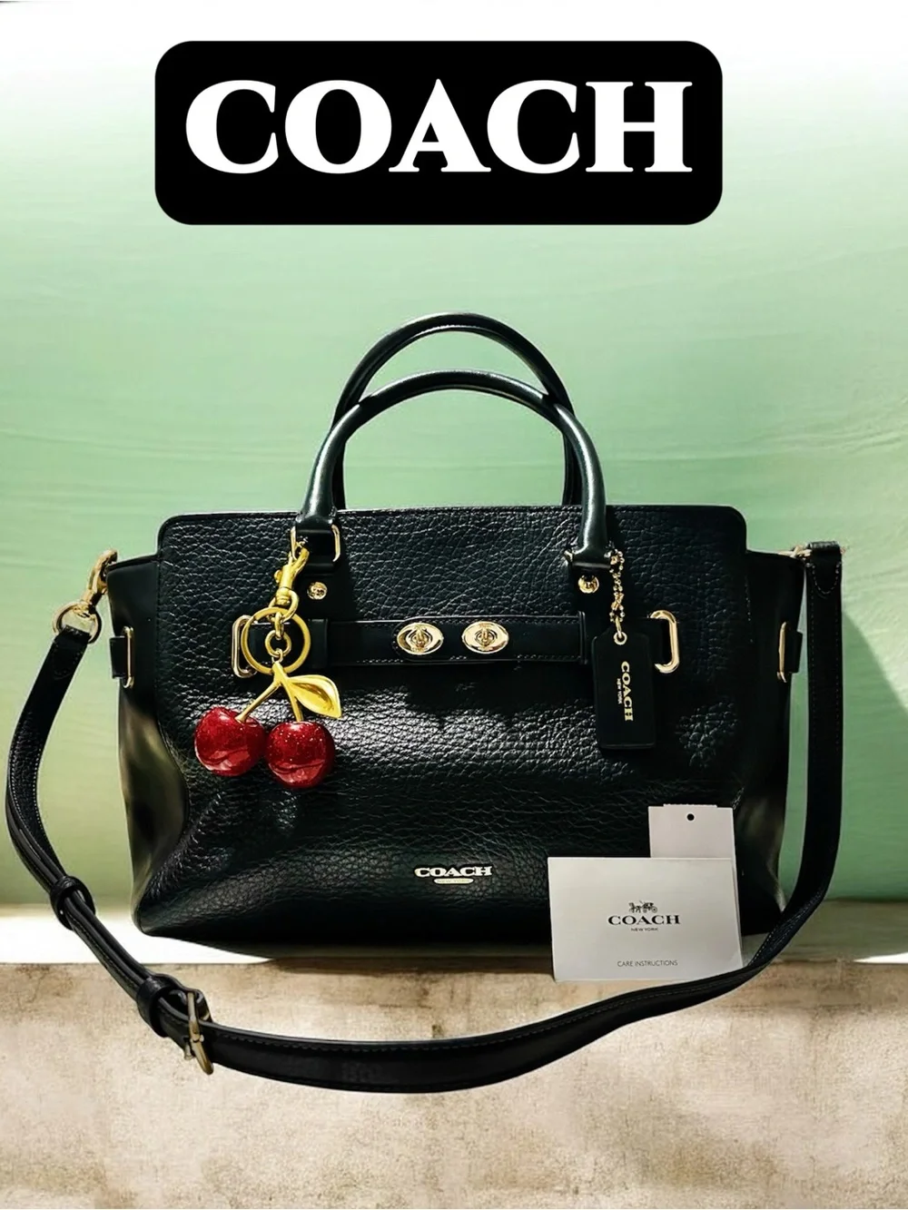 Coach Black Pebbled Leather Satchel with Cherry Charm and Gold Hardware